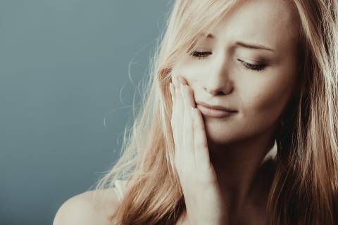 A Woman Experiences a Jaw Pain and Wonders What Could Be Causing It
